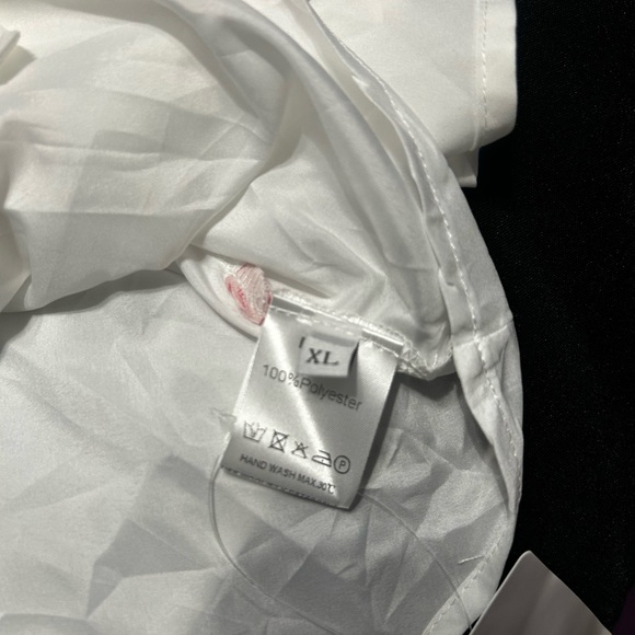 Elegant White Sleeveless Dress - Picture 7 of 7